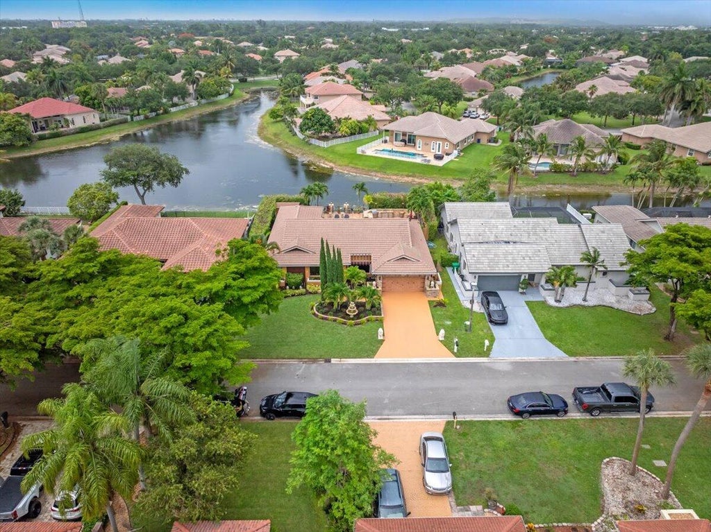 Photo of 5357 NW 58th Terrace, Coral Springs, FL 33067 (MLS # B26042235)