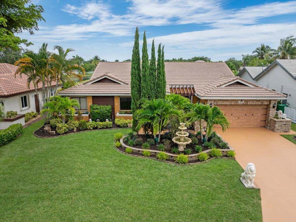 Photo of 5357 NW 58th Terrace, Coral Springs, FL 33067 (MLS # B26042235)