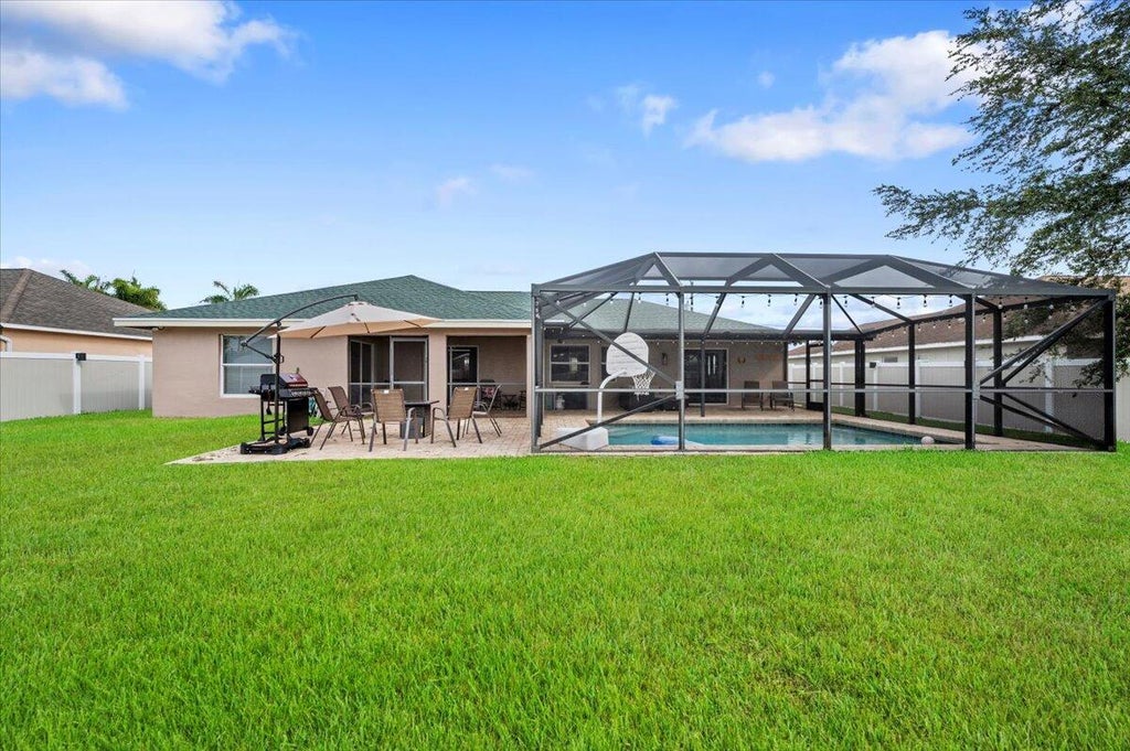 Photo of 918 SW JEREMKO Avenue, Port Saint Lucie, FL 34953 (MLS # B26080726)