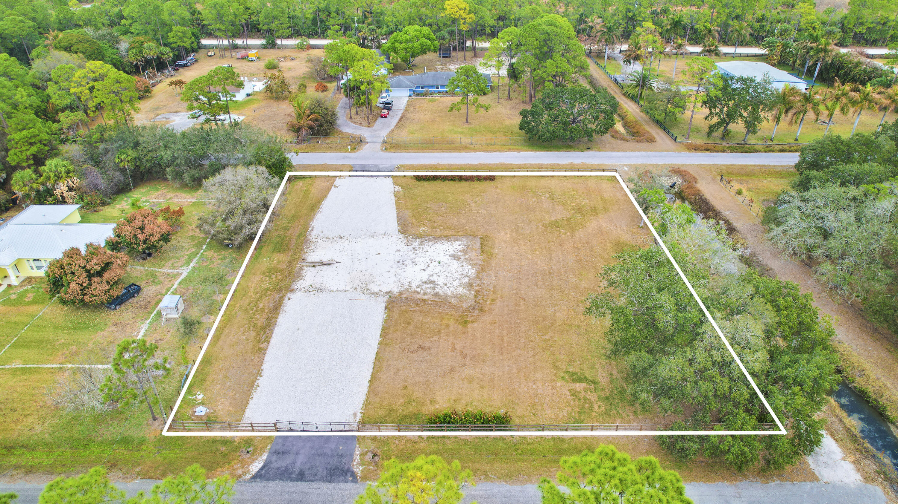 THE ACREAGE - Land