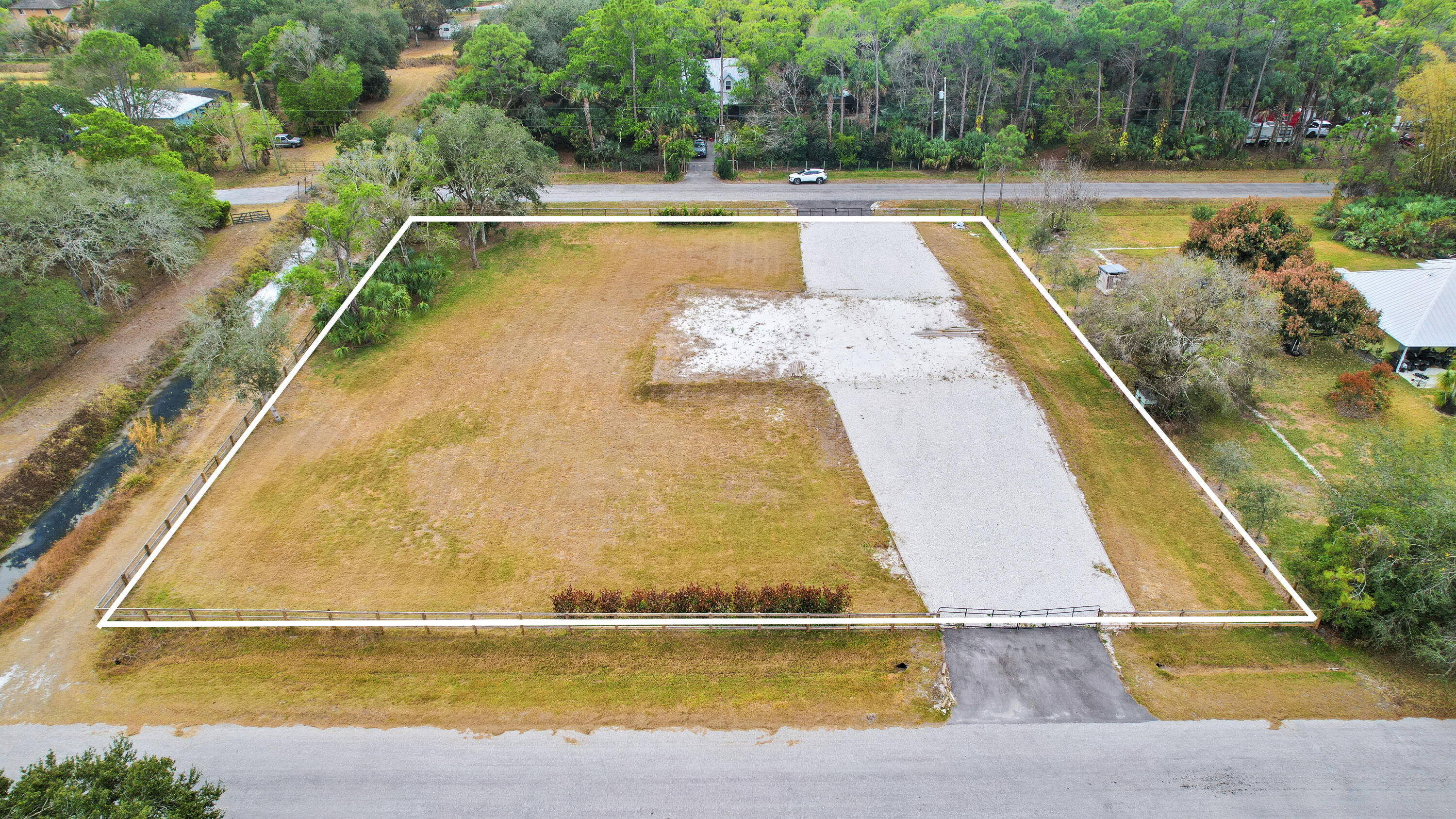 THE ACREAGE - Land