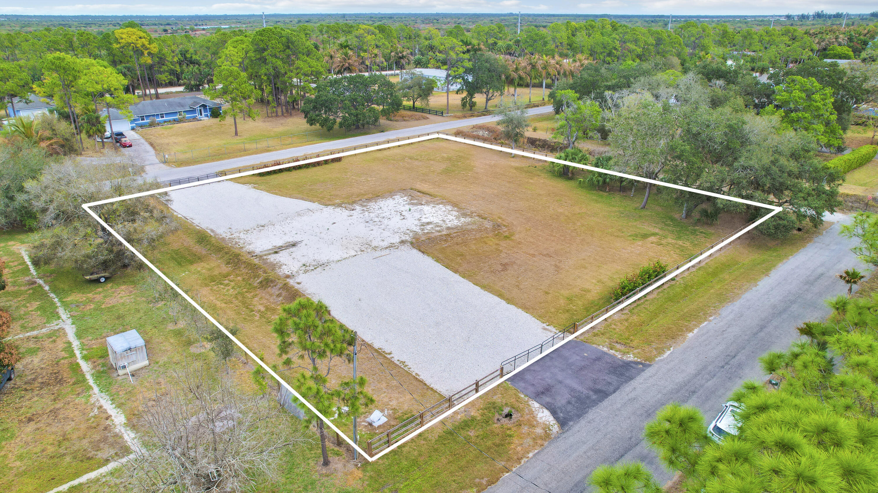 THE ACREAGE - Land