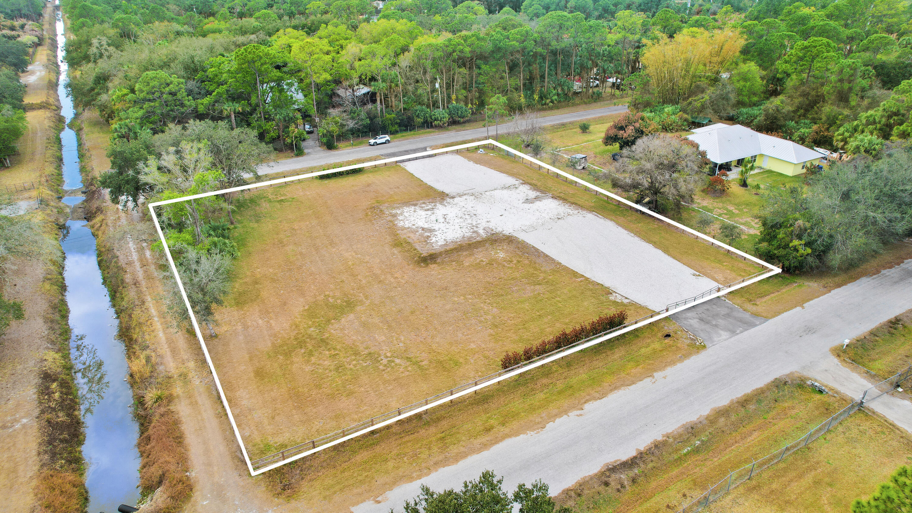 THE ACREAGE - Land