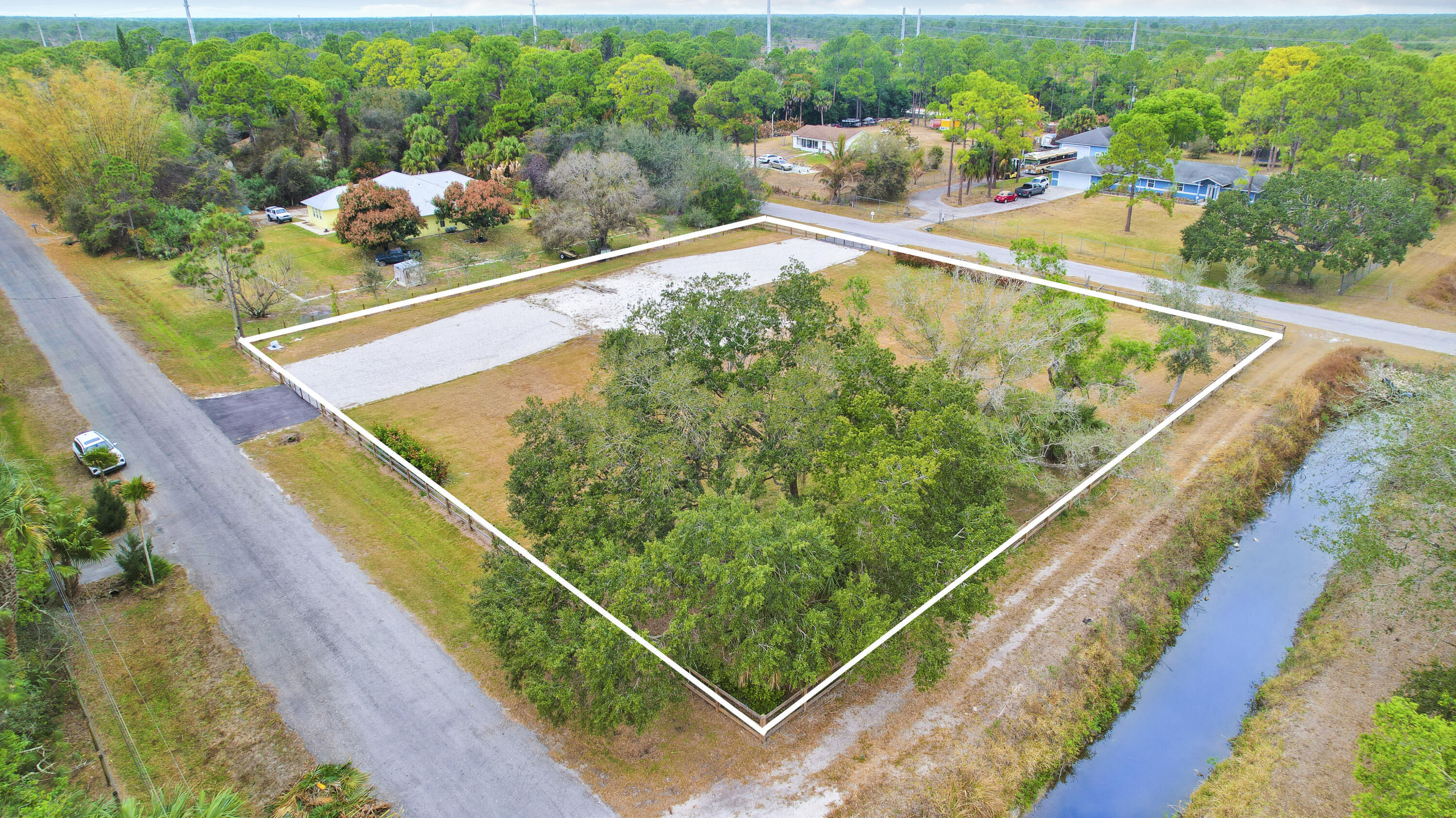 THE ACREAGE - Land