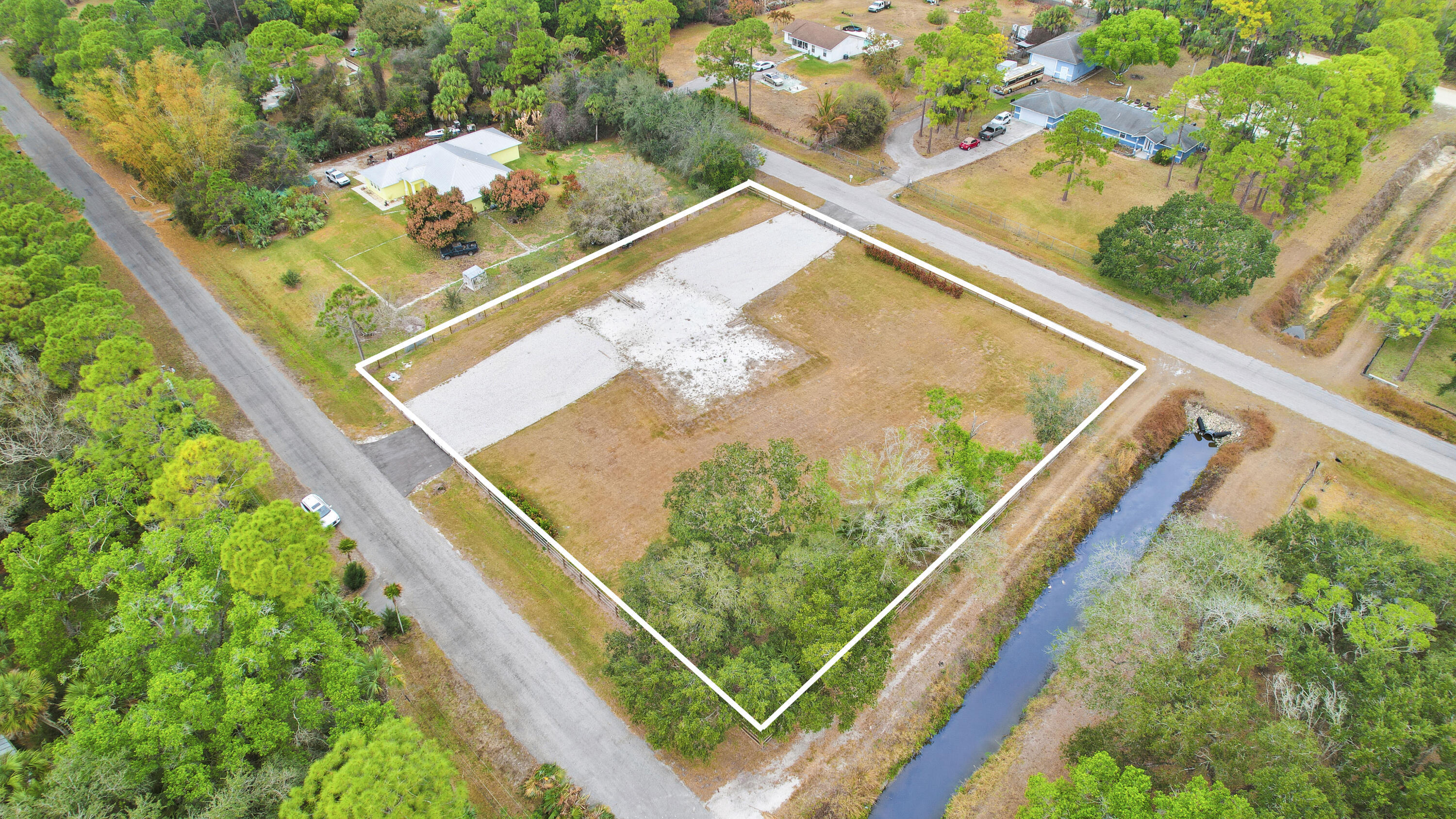 THE ACREAGE - Land
