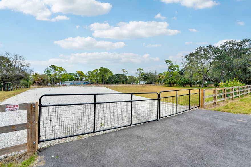 Discover an exceptional opportunity to build your dream home on this beautifully improved 1.48-acre lot located on a quiet paved dead-end street in The Acreage. This property offers privacy and convenience with new perimeter fencing and gates, two blacktopped gated entrances, a compacted building pad already in place, a new well, and full sod throughout. Ideal for a custom estate with room for a pool and outdoor amenities, all while enjoying a peaceful setting with easy access to shopping, dining, and schools in Palm Beach County. A rare, ready-to-build opportunity you won't want to miss. Muck was identified on the site and has been removed. Soil test available upon request.