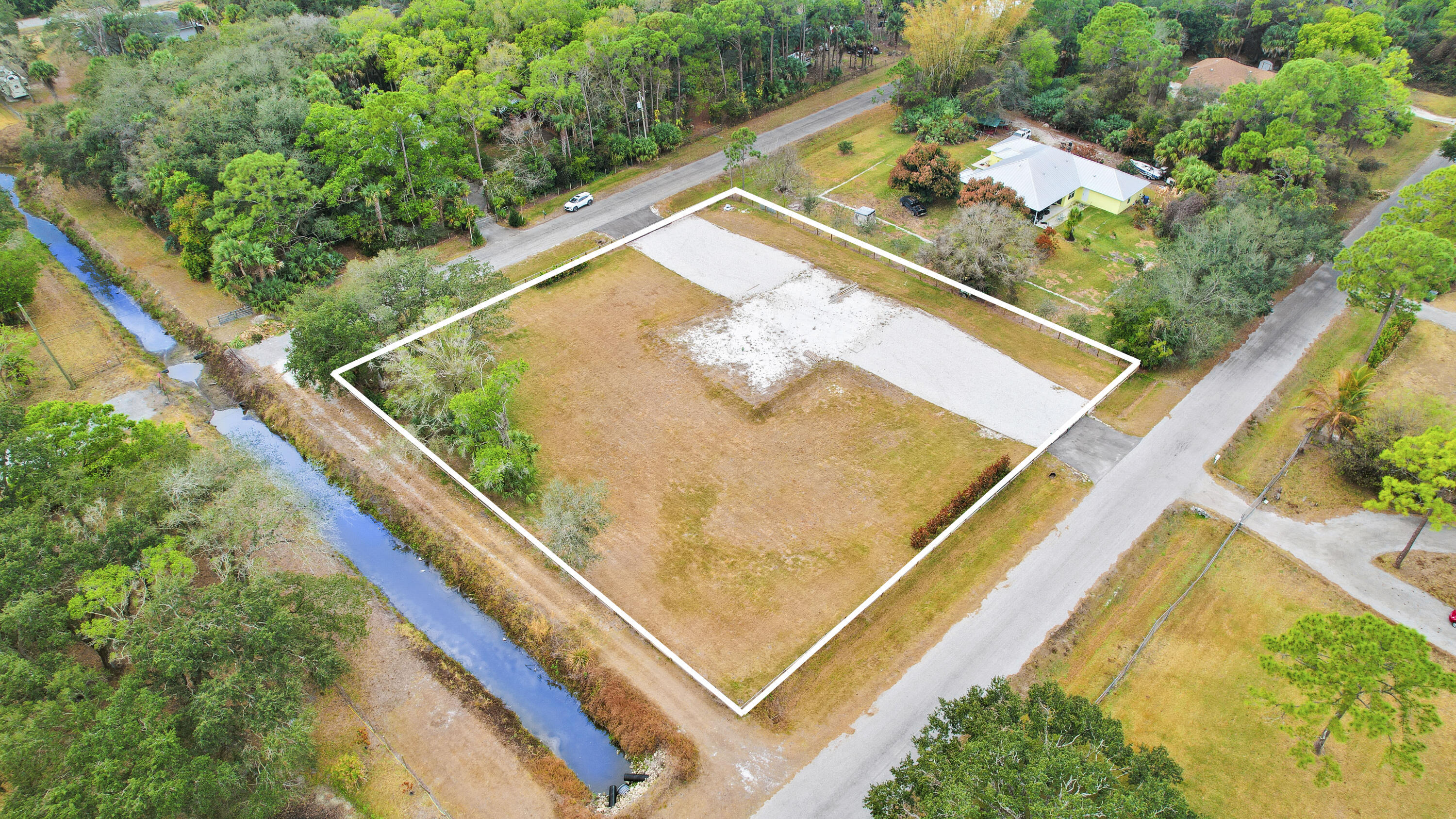 THE ACREAGE - Land