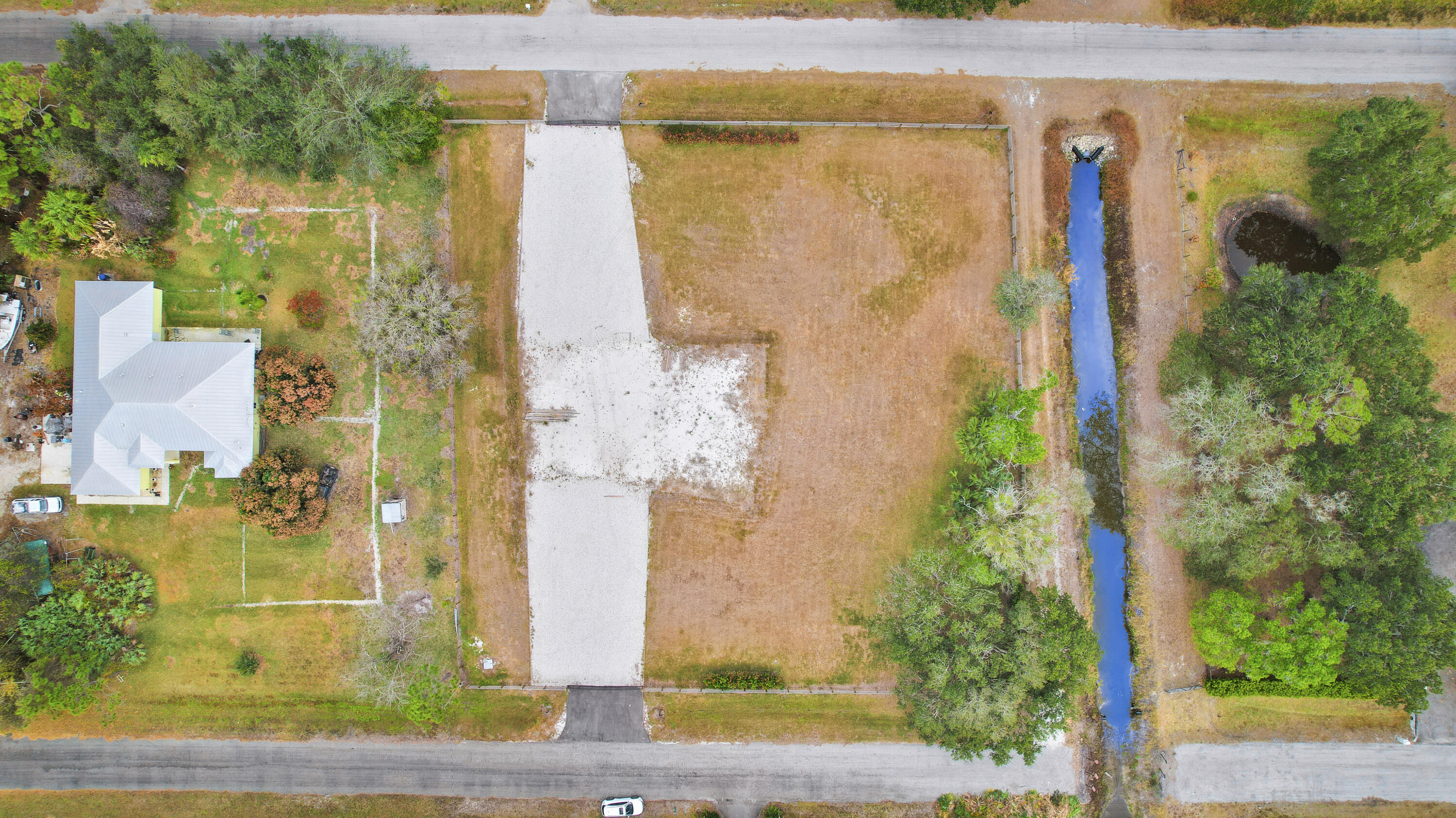 THE ACREAGE - Land