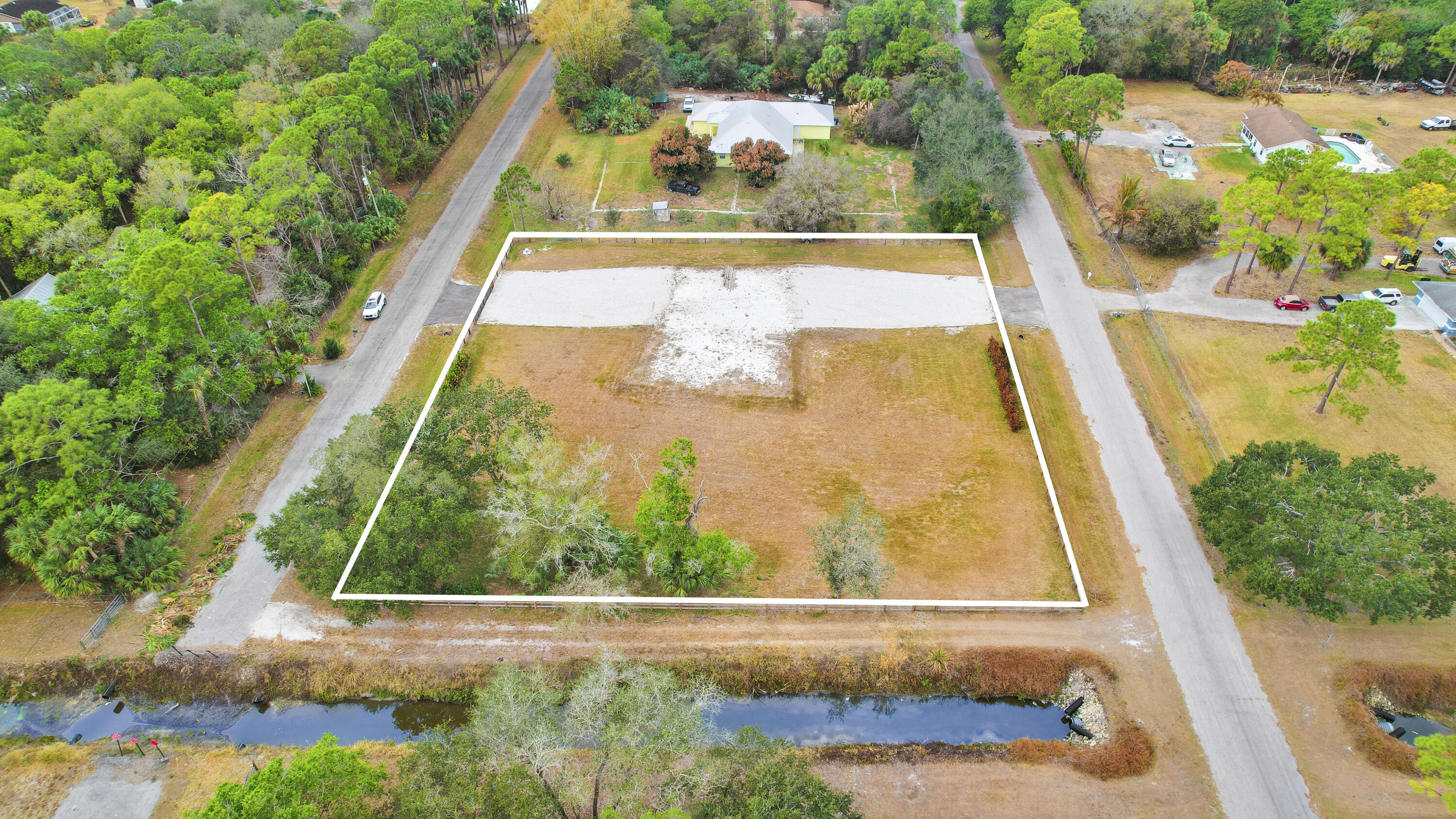 THE ACREAGE - Land