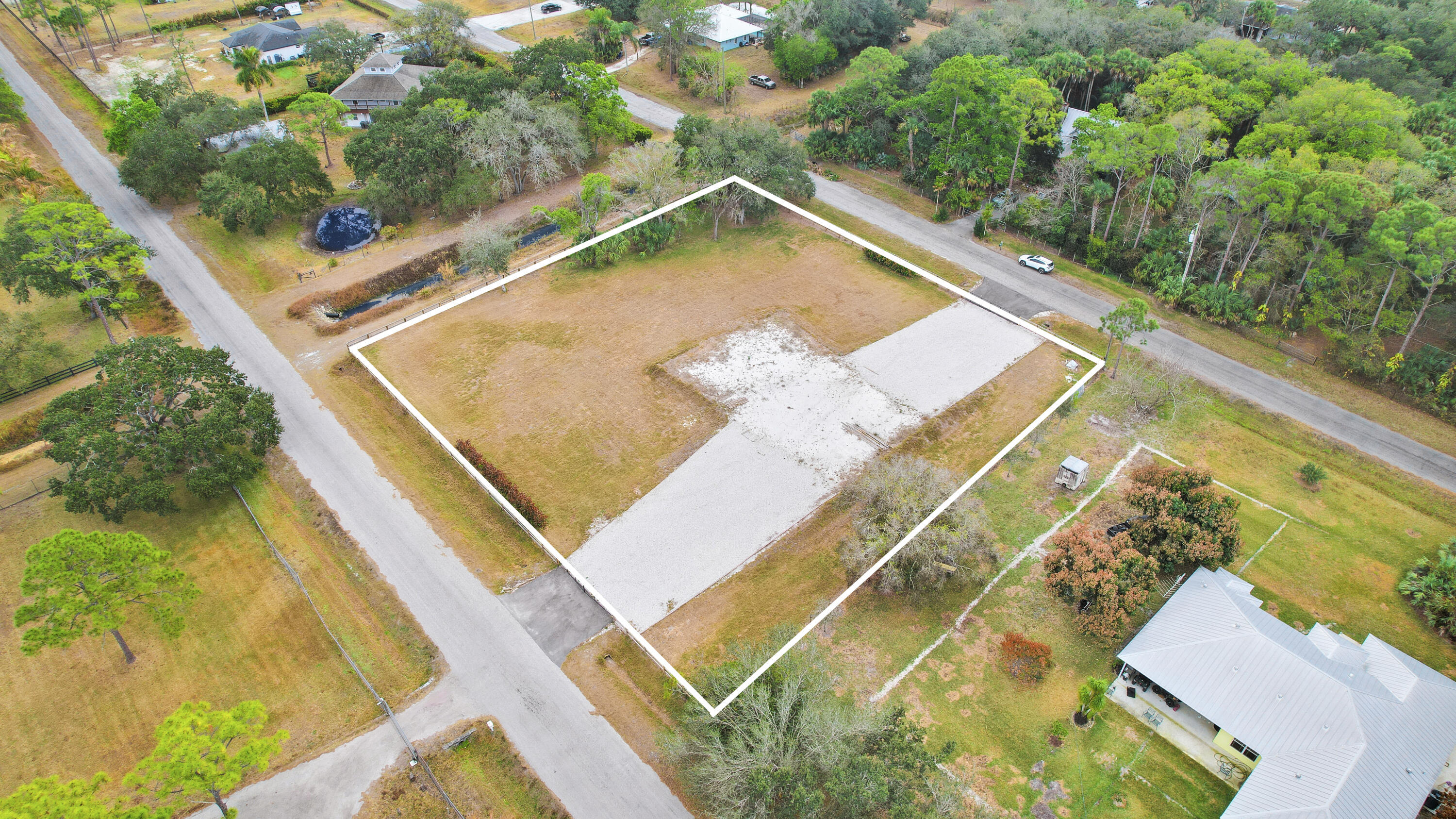 THE ACREAGE - Land