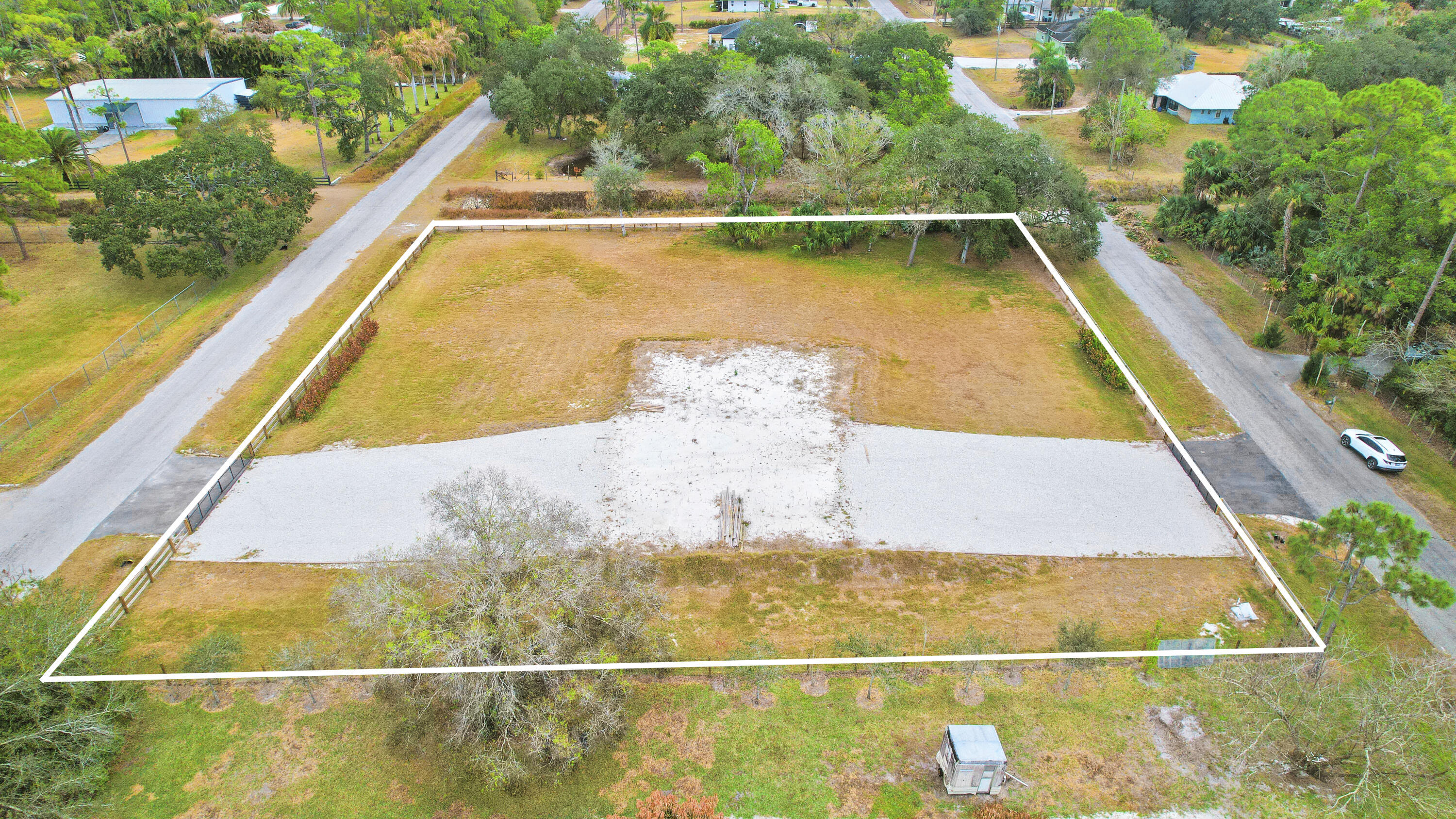 THE ACREAGE - Land