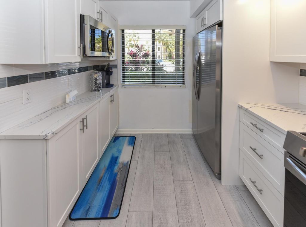 Photo of 1001 Seafarer Circle #102, Jupiter, FL 33477 (MLS # R11087839)