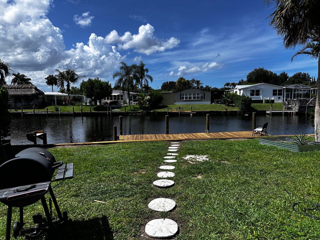 Photo of 7882 SE PARADISE Drive, Stuart, FL 34997 (MLS # B26053789)