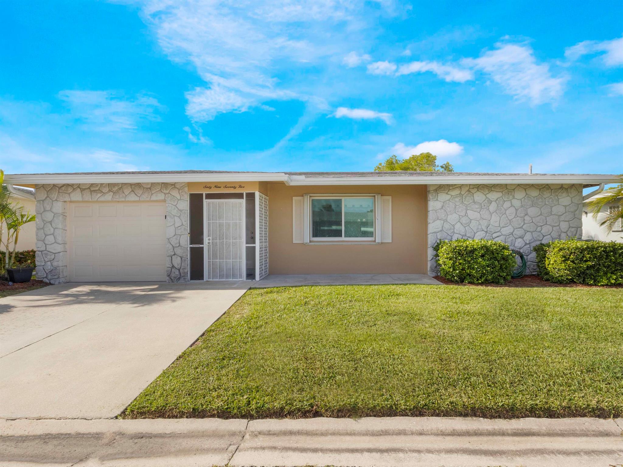 Welcome to the highly sought after 55+ community of Paradise Gardens in the heart of Margate. This Home Boasts Impact Windows and Accordion Shutters for complete peace of mind in even the strongest of storms. Roof 2017, A/C 2019, Water Heater 2022. This is the El Dorado model which offers plenty of space to add an additional bedroom or an office if needed. Low HOA fees of just $100/month, you'll enjoy weekly lawn care, exterior painting every five years, and access to a clubhouse within a 3 min walk with a pool, fitness room, billiards and card rooms. Conveniently located near highways, Publix and major retail stores, this home offers both comfort and accessibility.