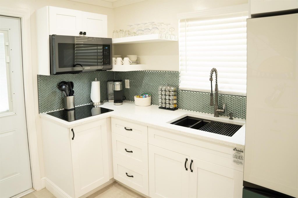 Photo of 1143 Concord Avenue, West Palm Beach, FL 33417 (MLS # R11113296)