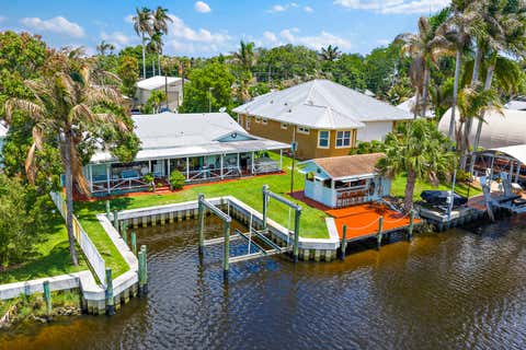 Photo of 715 SW Rustic Circle, Stuart, FL 34997 (MLS # B26042852)