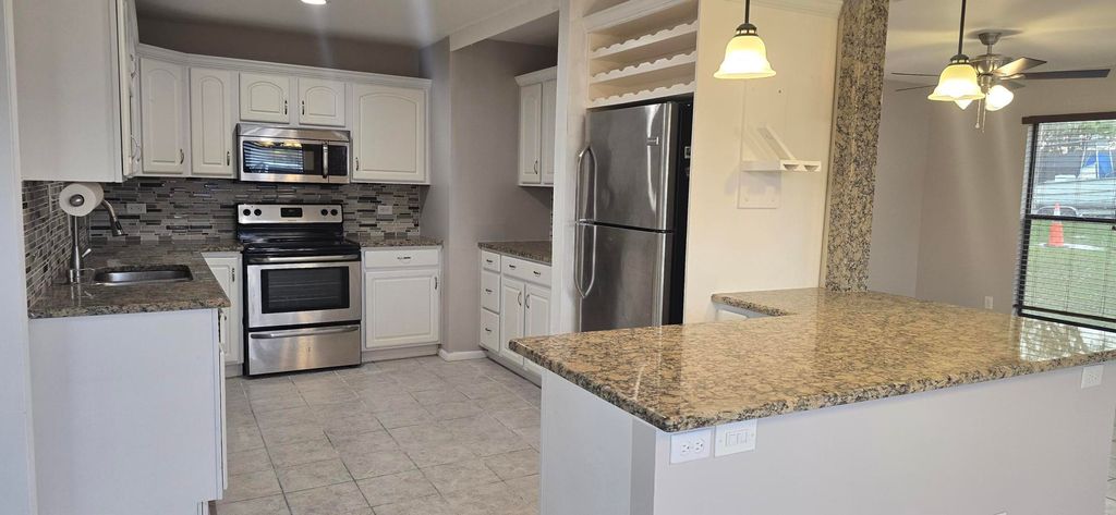 Photo of 342 NE Genesee Avenue, Port Saint Lucie, FL 34983 (MLS # R11168530)