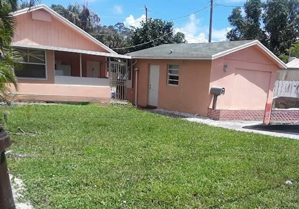 Photo of 1017 W Lakewood Road, West Palm Beach, FL 33405 (MLS # R11127136)