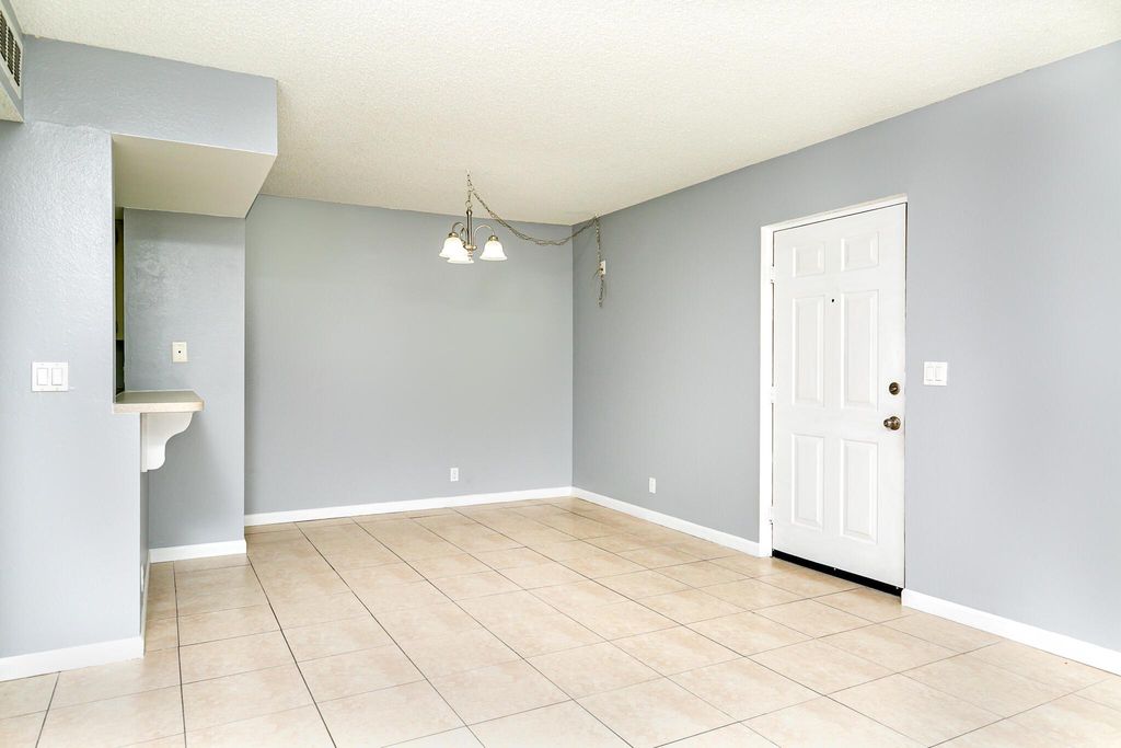 Photo of 1530 SE Royal Green Circle #203, Port Saint Lucie, FL 34952 (MLS # R11093649)