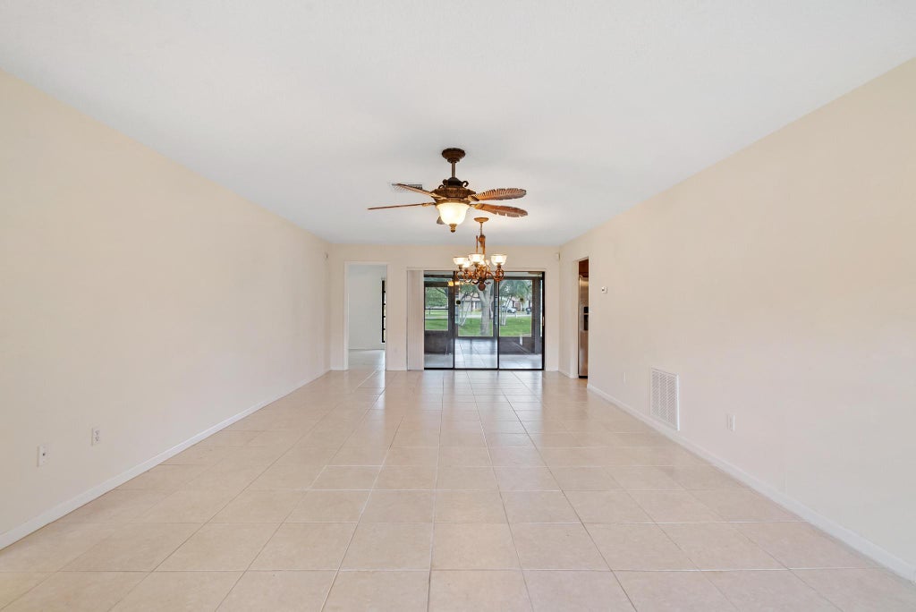 Photo of 6315 TALL CYPRESS Circle, Greenacres, FL 33463 (MLS # B26068693)