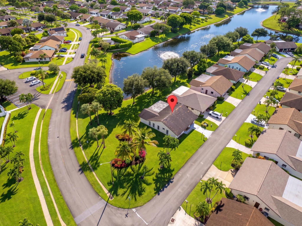 Photo of 6315 TALL CYPRESS Circle, Greenacres, FL 33463 (MLS # B26068693)