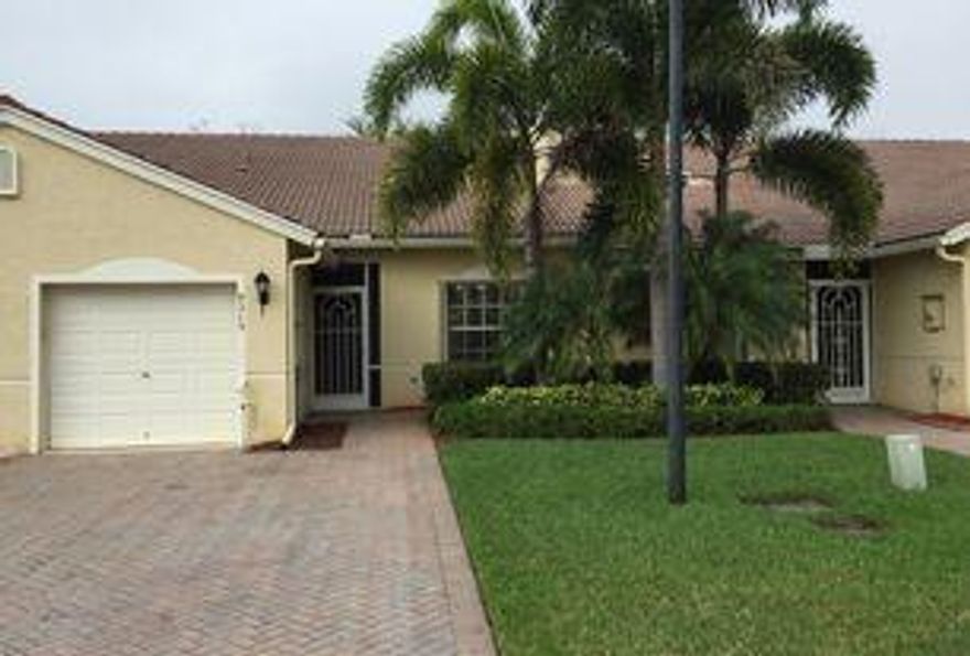 Location! Location! Location! Baywinds is one of the most desirable 55+ Communities in West Palm Beach. This Beautiful Move-In condition 2/2 with Home Office/Den offers a large Kitchen with lots of cabinets,granite counter-tops and stainless steel appliances. Large master bedroom has custom walk in closet, and both master and guest bathrooms have quartz counter-tops and are elegantly tiled throughout.. Villa also offers a separate laundry room, tinted sliding doors that open to a screened-in patio and Hurricane Shutters. Entire home is perfectly designed for your comfort and enjoyment. Across from the lake and main clubhouse, this home is within walking distance of all the amenities.. Call for an Appt today, this one won't last