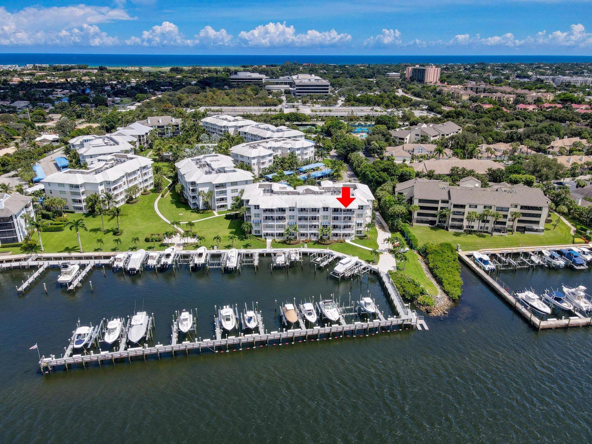 This is THE premier penthouse in Bay Colony, featuring a 27' balcony with direct Intracoastal views. Built in 2015, this bright, spacious 3/3 home is the only 4th floor residence with direct water views to the west and south. A house-sized gourmet kitchen, open floor plan living area and 3 split bedrooms make this a gracious home. Attention to detail is evident throughout, with $400K+ in upgrades and timeless design. A endless parade of boats and the beauty of sunshine on the water and nightly sunsets are the view from floor-to-ceiling sliders in the living room and master bedroom, plus direct water views from every room. Minutes from the beach, Bay Colony offers a private marina, tennis, pickle ball, pool, firepit and fitness center. Pets are welcome. This is a VERY special home!