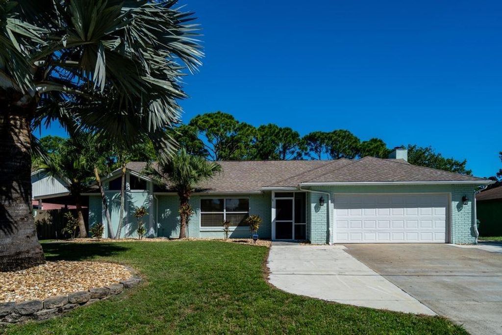 Photo of 409 SE Voltair Terrace, Port Saint Lucie, FL 34983 (MLS # B26031020)