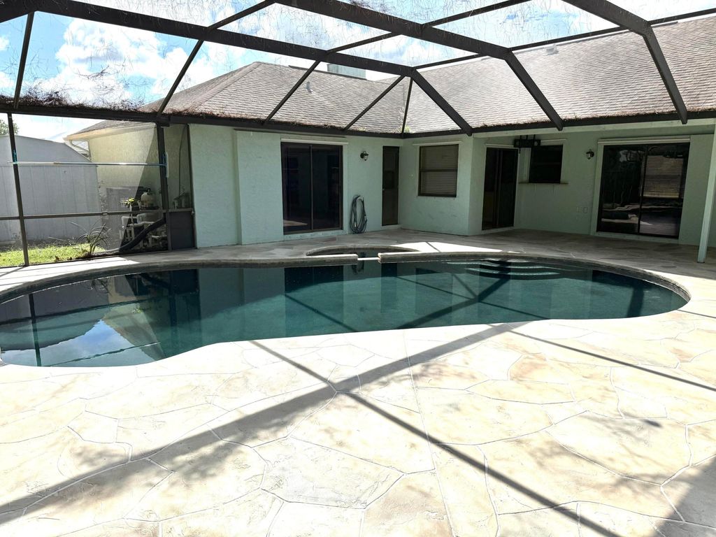 Photo of 409 SE Voltair Terrace, Port Saint Lucie, FL 34983 (MLS # B26031020)