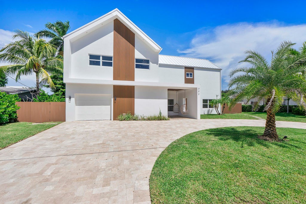 Photo of 303 SW 14TH Place, Boca Raton, FL 33432 (MLS # B26077884)