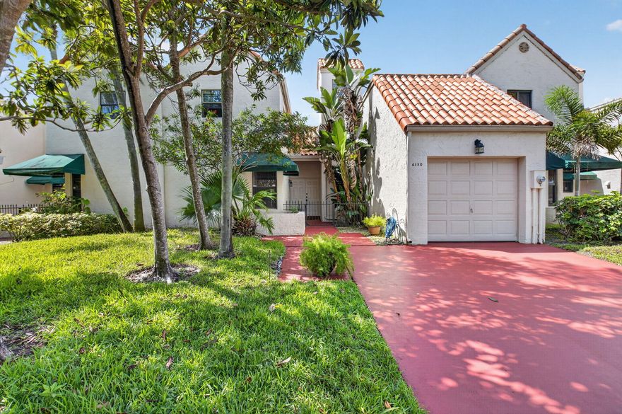 Custom design, fully renovated turnkey townhome in the heart of Boca Raton. This 3BR/2.5BA residence features bird's-eye maple cabinetry, GE Monogram & Bosch appliances, and granite countertops with full backsplash. The main level offers soaring 18-ft wood beam ceilings and Italian Bianca Saturnia honed marble flooring. Two ground-level bedrooms include one with bamboo flooring and a furnished office with ceramic wood floors. Sliding doors open to a screened patio with brick pavers and Jenn-Air BBQ. Upstairs, the primary suite features a terrace, new faux wood flooring, and a custom dressing room. Spa-style bath with double marble shower and Waterworks fixtures. Roche Bobois wall unit included. New flat roof + tile roof over garage. Furniture negotiable.
