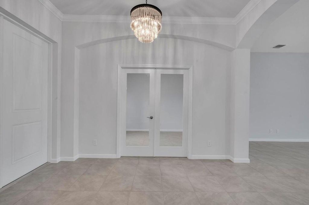 Photo of 1445 SW Leisure Lane, Port Saint Lucie, FL 34953 (MLS # R11138030)