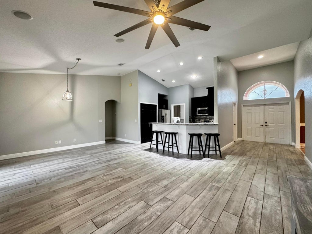 Photo of 143 SW Glenwood Drive, Port Saint Lucie, FL 34984 (MLS # R11110243)