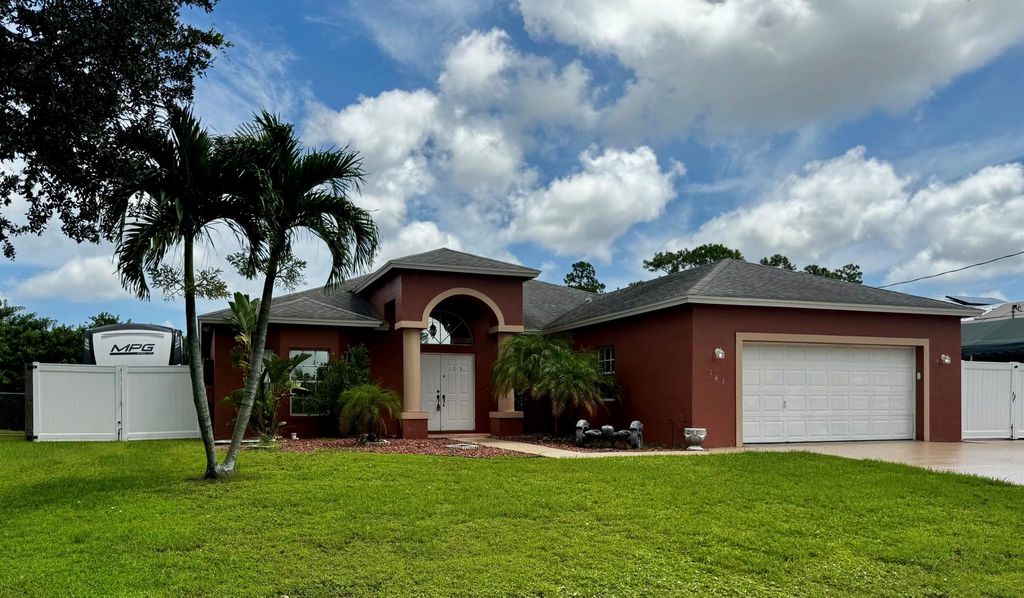 Photo of 143 SW Glenwood Drive, Port Saint Lucie, FL 34984 (MLS # R11110243)