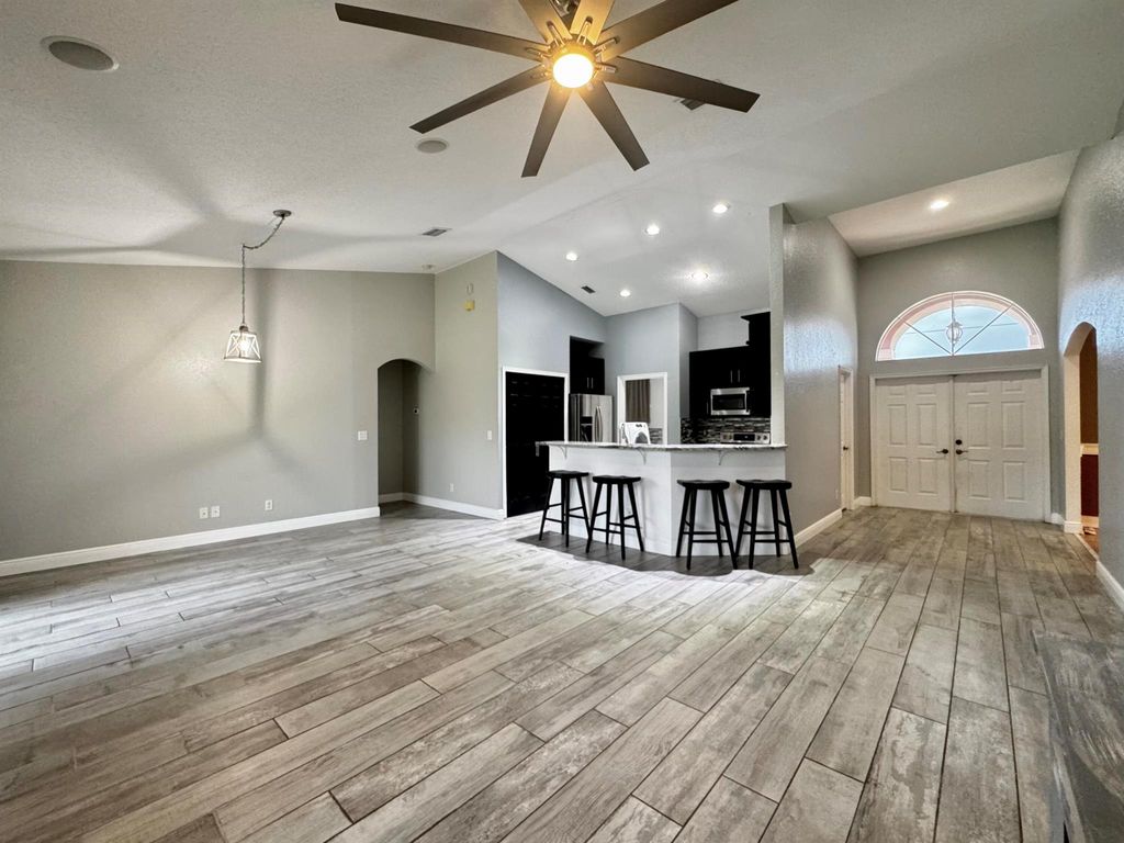 Photo of 143 SW Glenwood Drive, Port Saint Lucie, FL 34984 (MLS # R11110243)