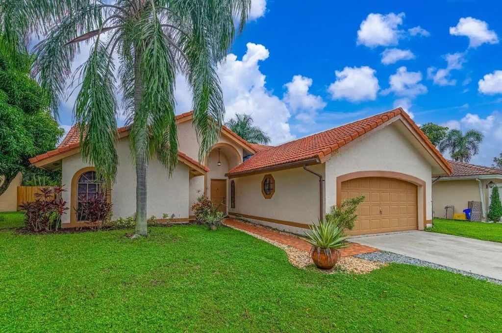 Photo of 5370 Helene Circle, Boynton Beach, FL 33472 (MLS # R11130646)