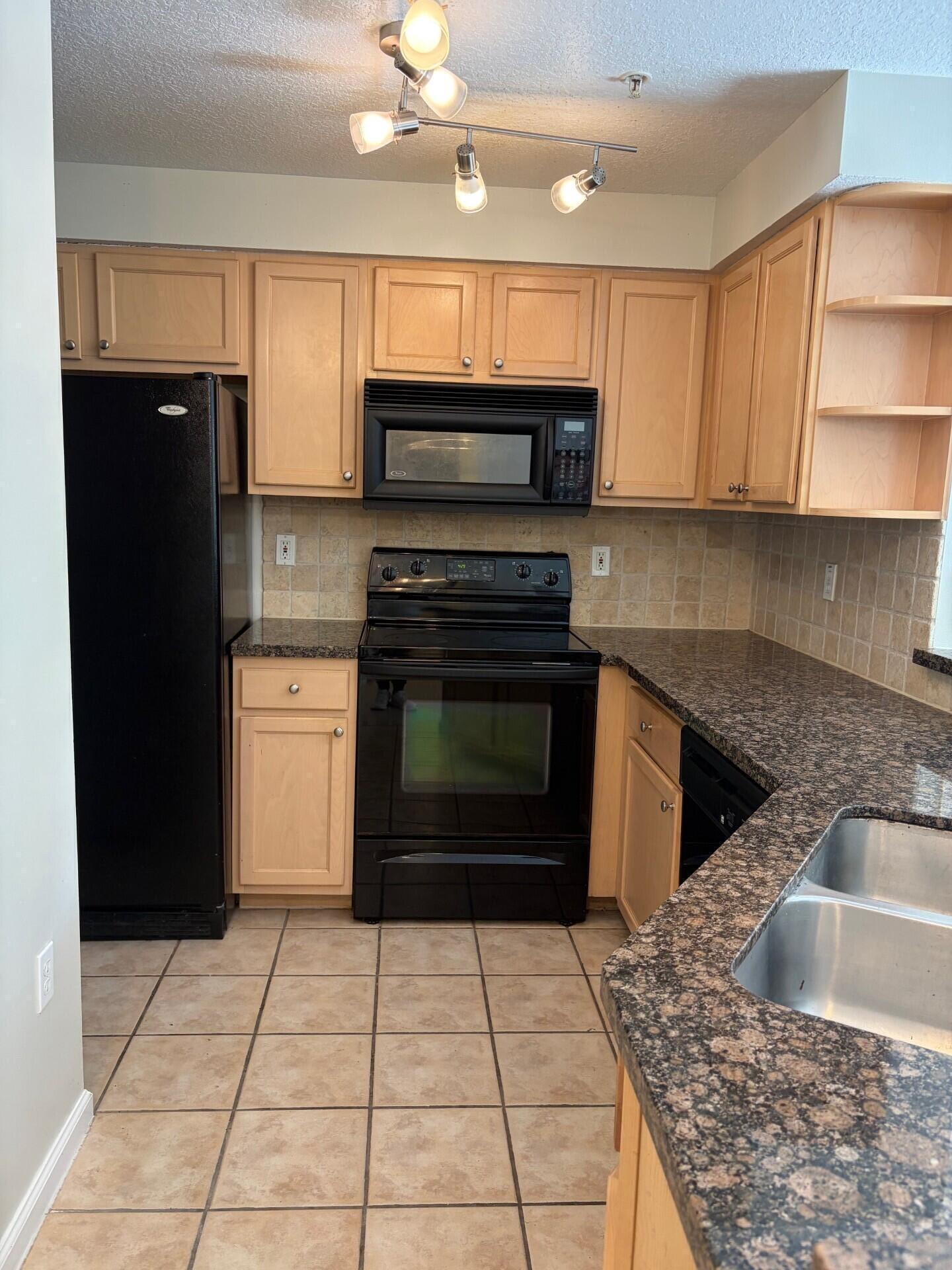 SOMERSET AT ABACOA CONDO - Residential