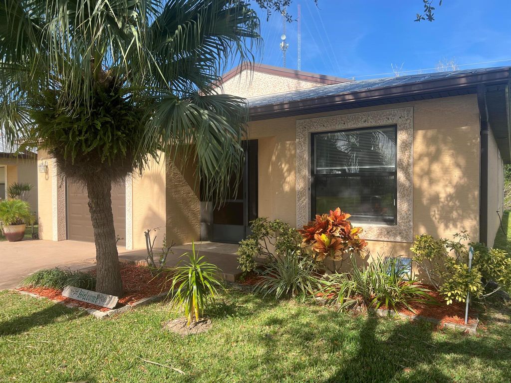 Photo of 64 Mediterranean Boulevard N, Port Saint Lucie, FL 34952 (MLS # R10955019)