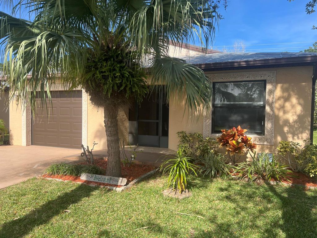 Photo of 64 Mediterranean Boulevard N, Port St Lucie, FL 34952 (MLS # R10955019)