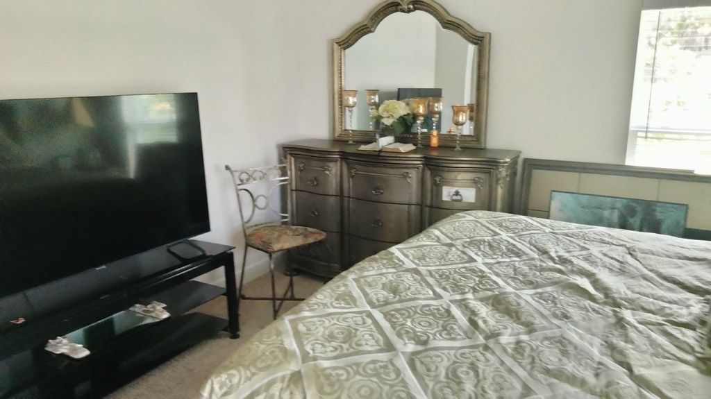 Photo of 463 Bowman Terrace, Port Charlotte, FL 33953 (MLS # B26001109)