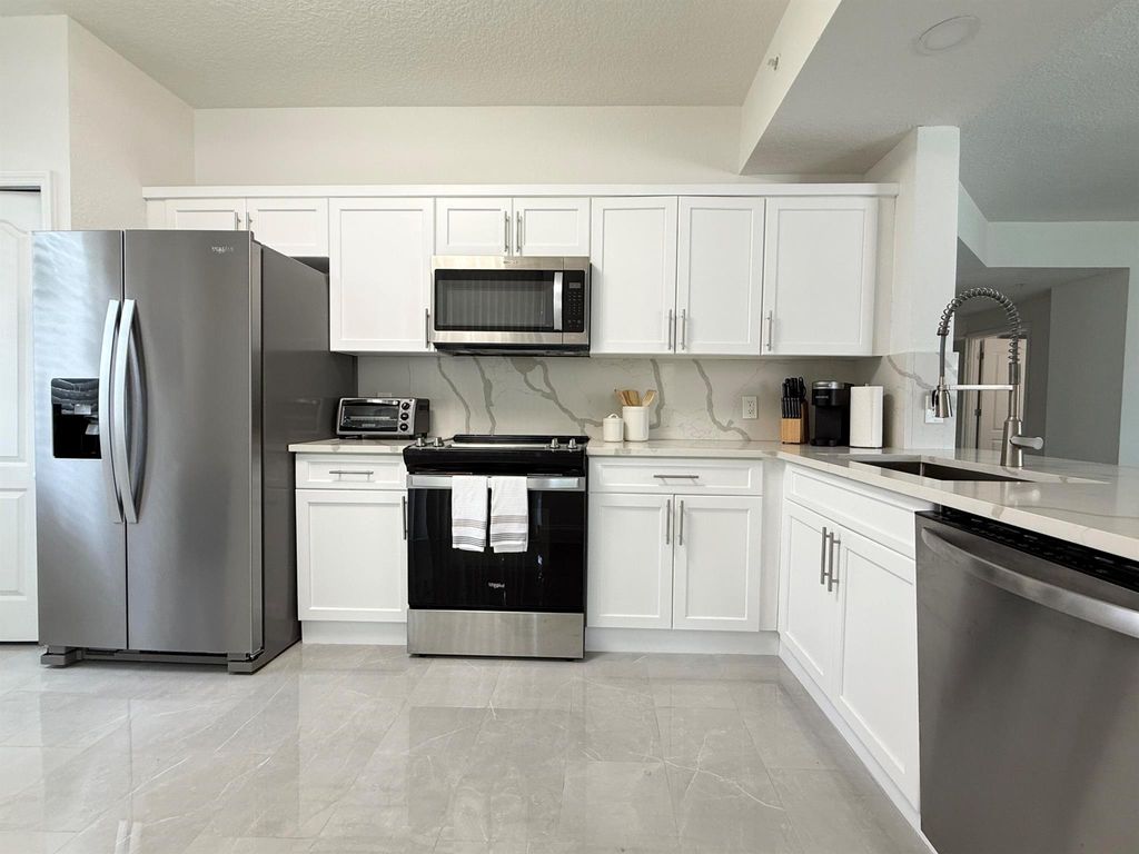 Photo of 11024 Legacy Drive #102, Palm Beach Gardens, FL 33410 (MLS # R11107033)