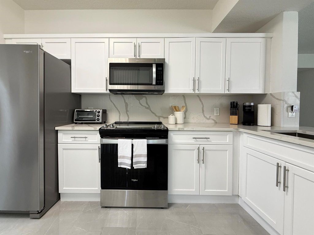 Photo of 11024 Legacy Drive #102, Palm Beach Gardens, FL 33410 (MLS # R11107033)