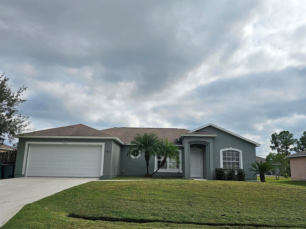 Photo of 162 SW Grimaldo Terrace, Port St Lucie, FL 34984 (MLS # R10932885)