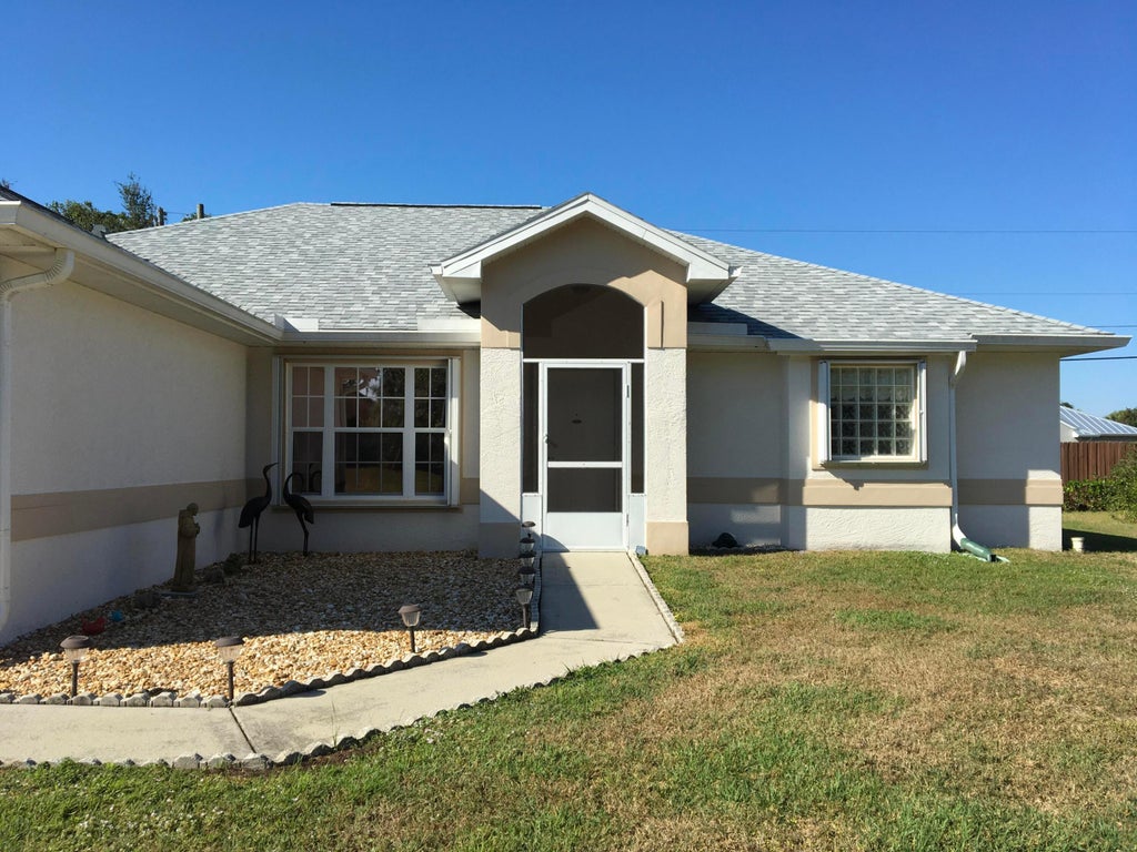 Photo of 1962 SW Americana Street, Port Saint Lucie, FL 34953 (MLS # R11150767)