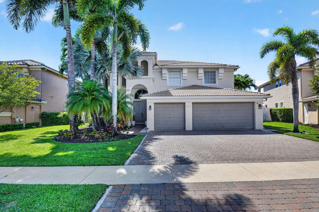 Photo of 2214 Ridgewood Circle, Royal Palm Beach, FL 33411 (MLS # B26029611)