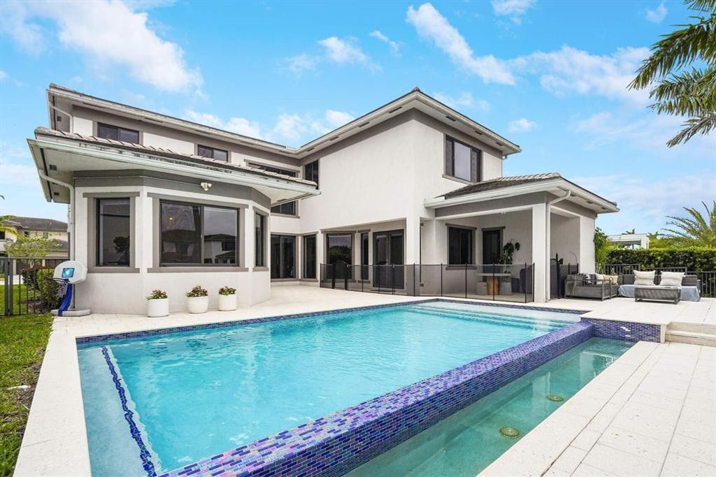 Photo of 10595 S Lago Vista Cir, Parkland, FL 33076 (MLS # F10543425)