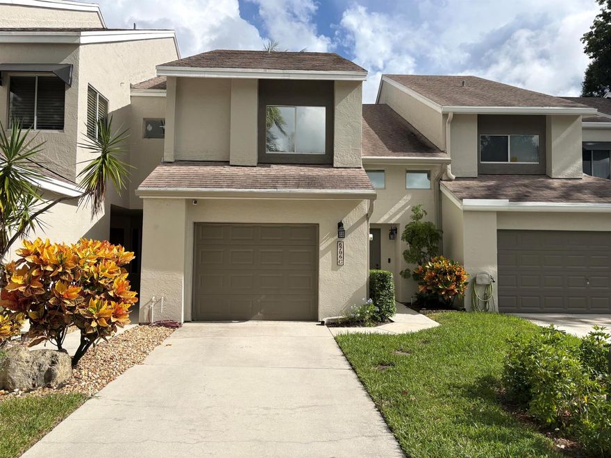 Nestled in the heart of Boca Raton, this two story townhome on a quiet cul-de-sac lot is a must see! Impeccably maintained 2 bedrooms 2.5 baths with a loft that could be converted to a 3rd bedroom. Neutral tile floors in main living area. Kitchen has SS appliances, granite counters and wood cabinetry. Adjacent dining area overlooking the living room & kitchen make for great  entertaining. Primary suite upstairs with wood floors and walk in closet. Primary bath has dual sinks and large walk in shower. One car attached garage and separate laundry room.Patio area in back with a serene garden view. Near lots of dining and shopping in central Boca Raton!