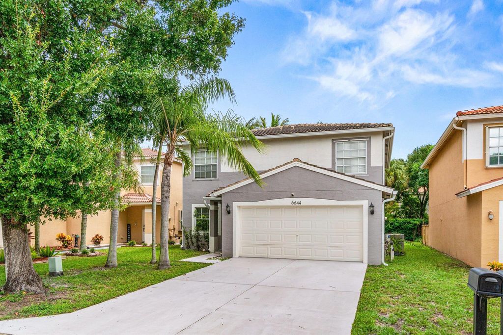Photo of 6644 Country Winds Cove #6644, Lake Worth, FL 33463 (MLS # R11120009)