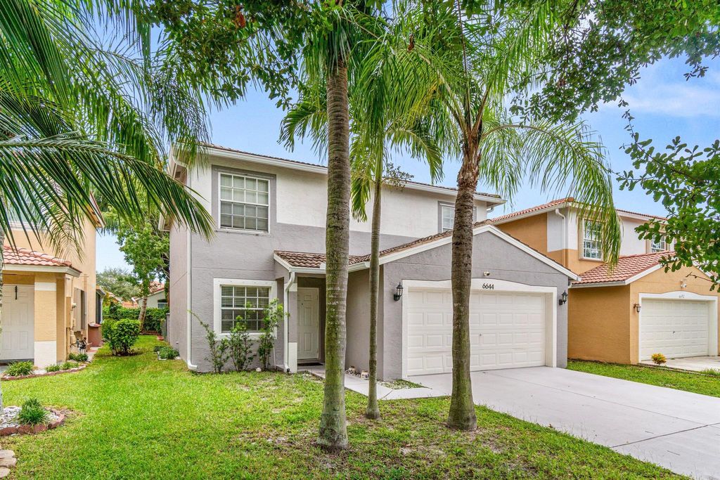 Photo of 6644 Country Winds Cove #6644, Lake Worth, FL 33463 (MLS # R11120009)