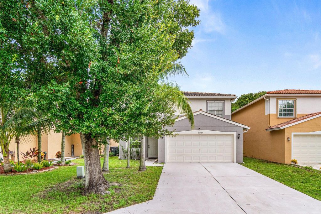 Photo of 6644 Country Winds Cove #6644, Lake Worth, FL 33463 (MLS # R11120009)